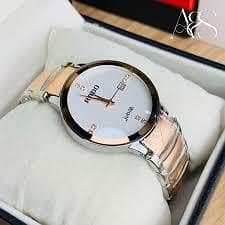 The watch in the image is a Rado Jubilé model.