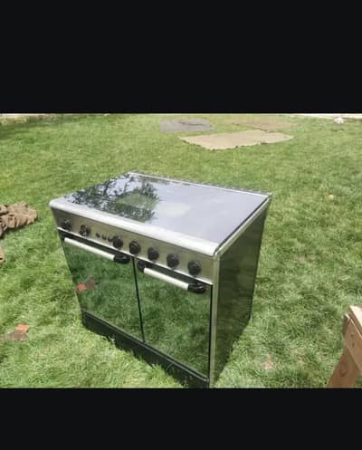 cooking range ambassador, 5 burners with baking oven and hot case.