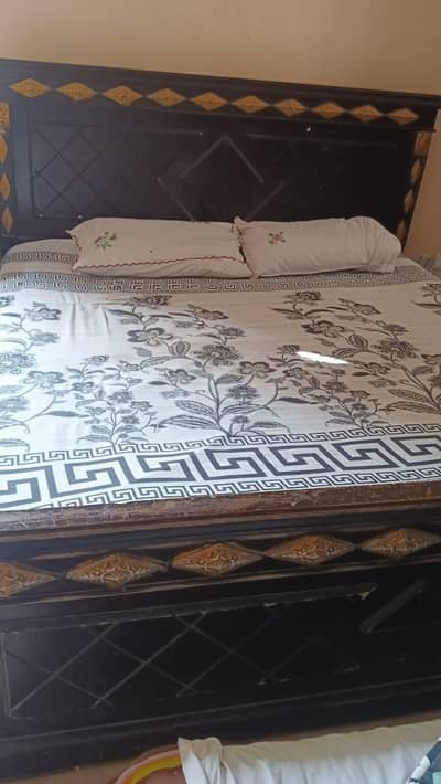 bed without mattress dressing table and 3 door almari with 2 side tab