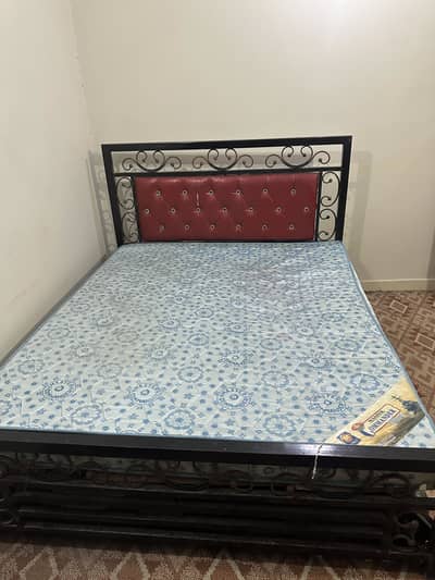 Iron bed with mattress