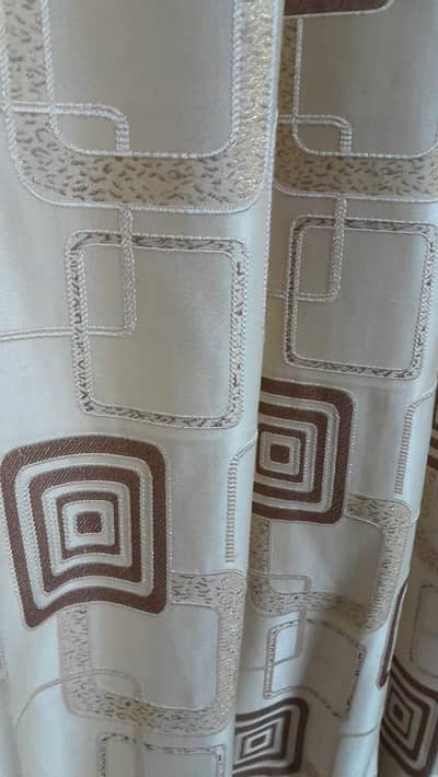 4 panels of fancy curtains