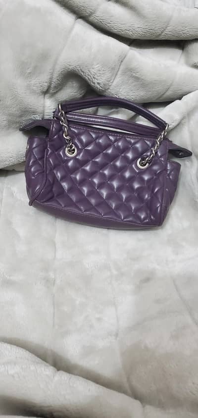 purple hand bag