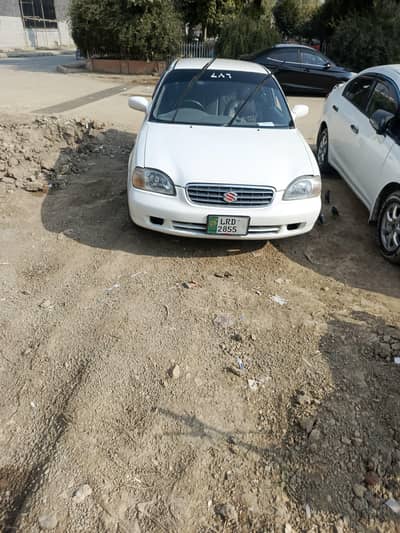 Suzuki Baleno 2002 — White Color — Excellent Condition