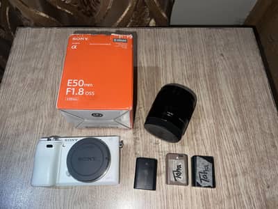 Sony a6000 (White) + Sony 50mm f1.8 OSS (with box)