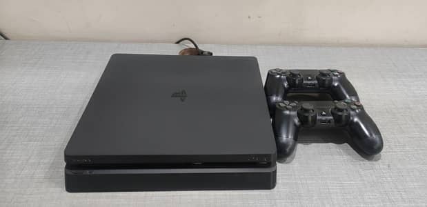 PlayStation 4 Slim + Extra Controller & Games - Great Condition