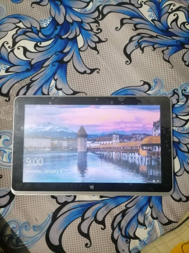 tablet and computer with charger 0