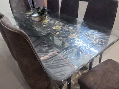 8 seater dining table with cushioned chairs