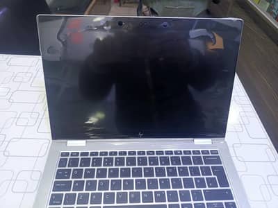 Malik Laptop waly Madina center near rexcity Faislabad