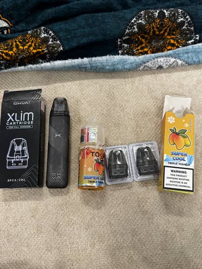 oxva xlim go slightly used with two packed 0.6 coils