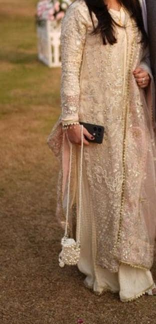 formal dress white color. embellished beautiful work