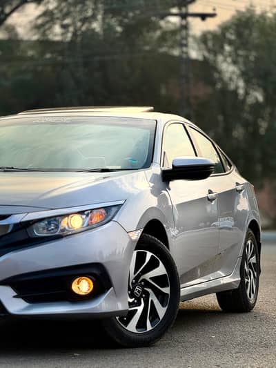 Honda Civic 2018 ( UG Red Meeter)