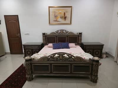 Pure Sheesham wood bed by N. M Furnishers . Bed with Side Tables .