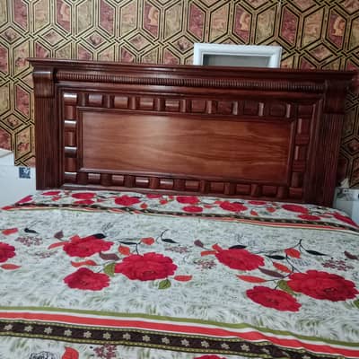 king size wooden bed  with dressing and sidetables