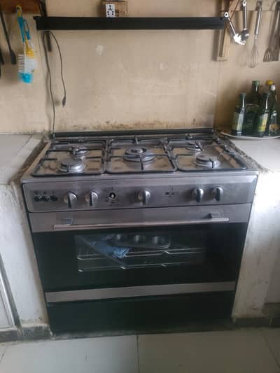 Indus brand electric + gas stove  and baking oven