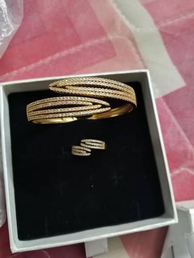 Golden bracelet and Ring