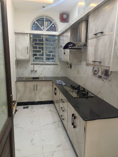 Brand new lower portion for rent 1bad attached bathroom TV launch drawing room kitchen woodwork