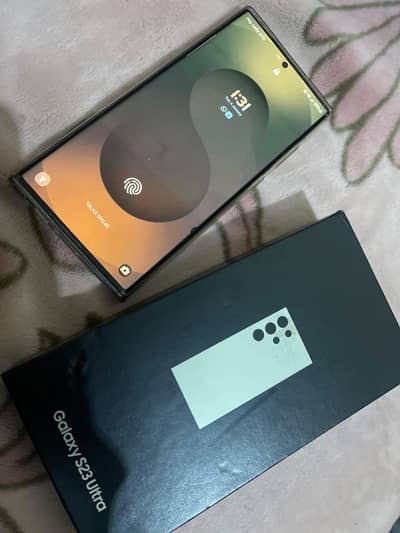 S23 Ultra with orignal cable and charger and box.