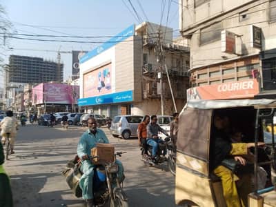 tariq road 1254 feet for bank/couare 584 feet ground and 674 mazanine