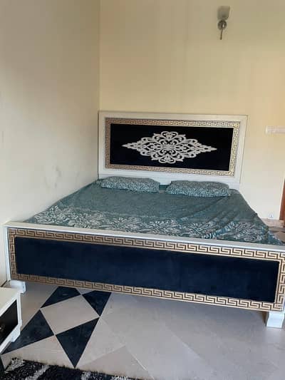 king size bed with matrress with 2 side tables and dessing table