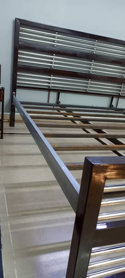 Selling king size iron bed (without mattress) with two side tables