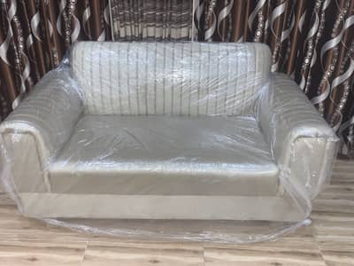New 2 seetr sofa urgent sale