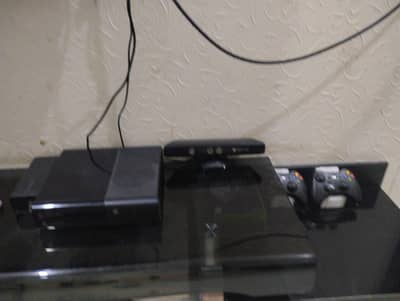 xbox with six cds  and 2  controlers