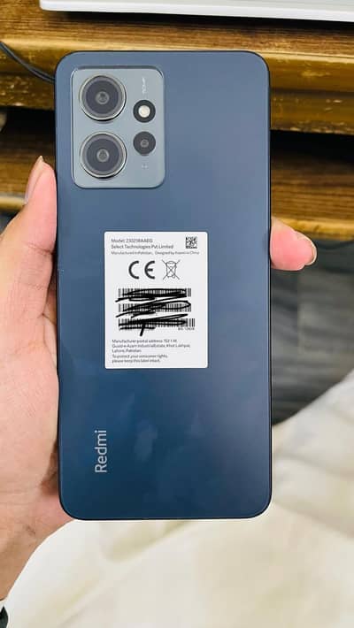 Redmi note 12 9 by 10 condition with box and changer