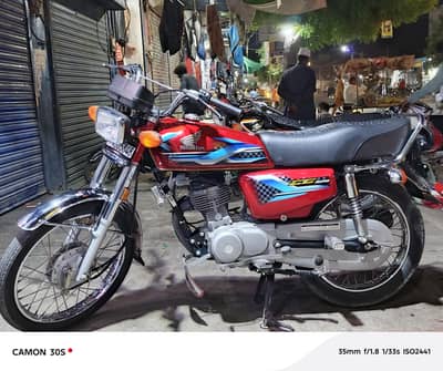 Honda 125  24Model red color used urgent sail Contacts my whtsap