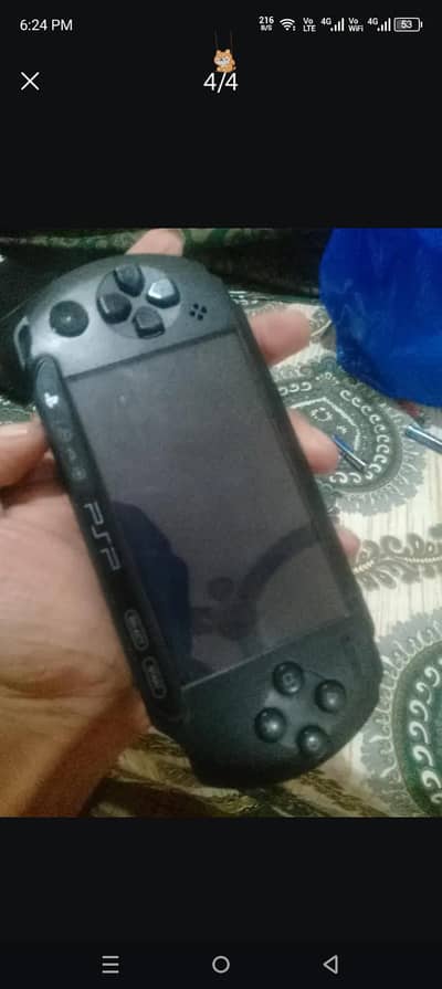 psp Sony with 16gb memory card and 10 CDs