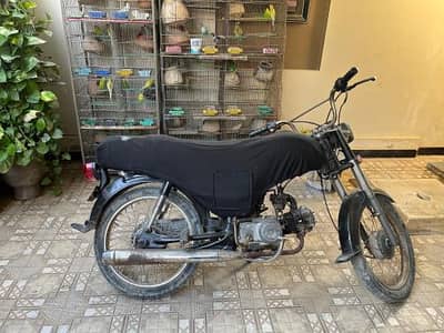 For sale is a custom-built 125cc motorcycle in good running condition.