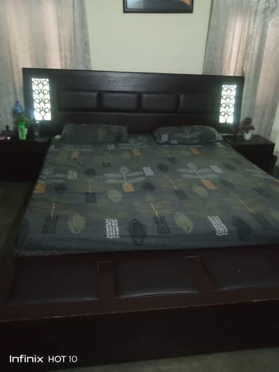 Bed with side tables