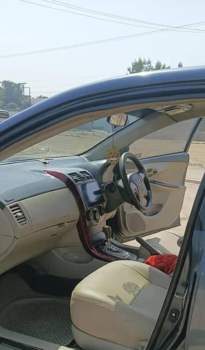 Toyota Corolla Altis 1.8 family used car no exchange just sale urgent