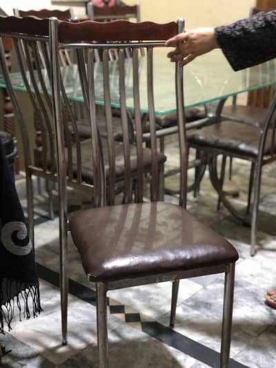 dining table  crrhom matel silver colour six chair ka  sath