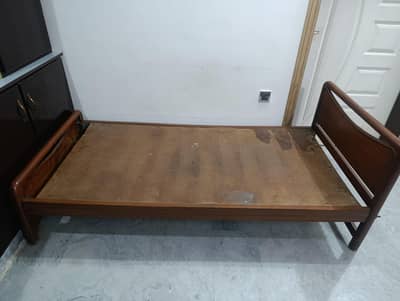 single wood bed with mattress