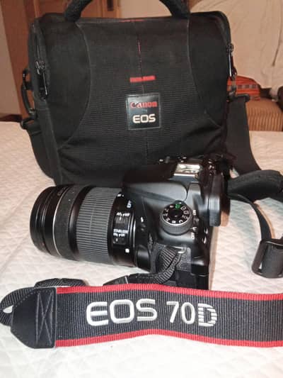 Canon eos 70d with 18-135mm canon lens with accessories