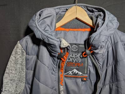 SuperDry , The North Face , Moncler