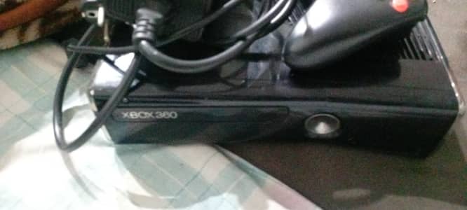 xbox 360 slim good condition with wire less controller