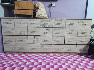 Cabinet with 28 drawers best for office files, jewelry making supplies