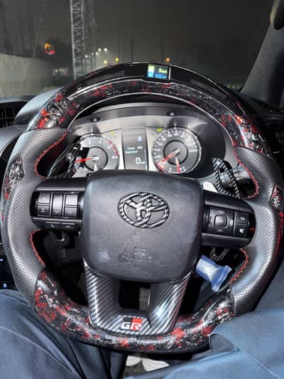 Revo steering led display with light  real forged from carbon action