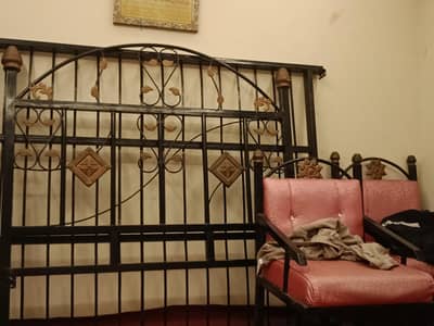 Black iron bed set available. contact with me 03092642603.