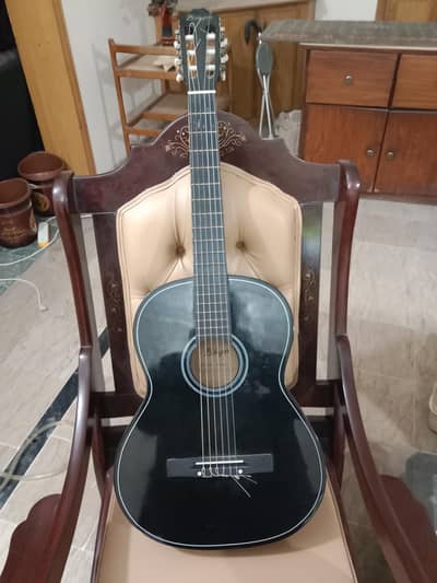 Unbranded used nylon string guitar
