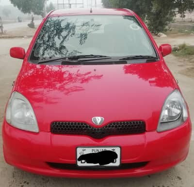 vitz red car