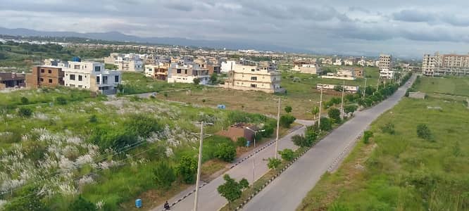 University town Islamabad Block E Size 1 kanal Main Double Road Plot Available For Sale