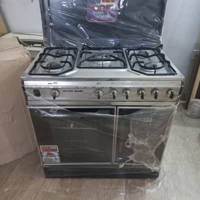 gas and electricity stove plus oven cooking range