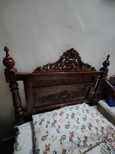 Wooden Chinioti 2 single beds new. . .