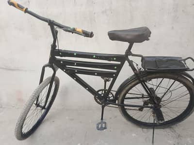 Used black bicycle for sale in good working condition.