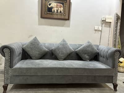 3 seater sofa with a table and 2 couches
