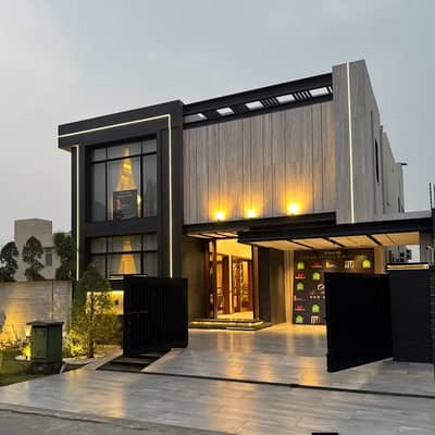 One Kanal Brand New Luxury Ultra-Modern Design Most Beautiful Fully Furnished Bungalow 2 Servant Quarter In Basement For Sale At Prime Location Of DHA Lahore Near To Park Masjid & DHA Raya Fairways Commercial.