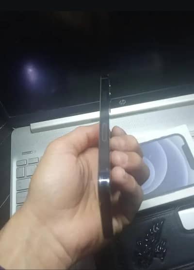 I phone 12 in apple warranty 97 % battery  WhatsApp no 03140077785