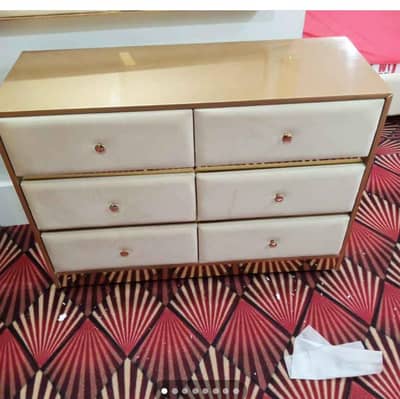 queen size bad and side table and dressing table